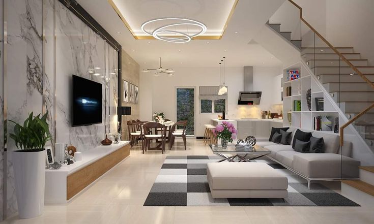 Sử dụng mặt ốp giả đá, cùng đèn chùm sang trọng cho nhà ống 