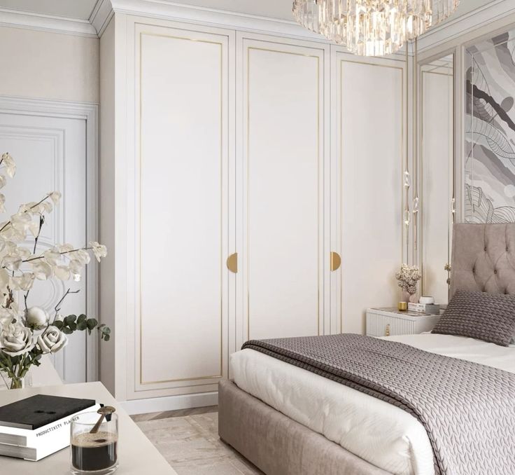 Mẫu tủ tân cổ cổ điển sang trọng, tinh tế với gam màu trắng cùng những đường nét ánh kim